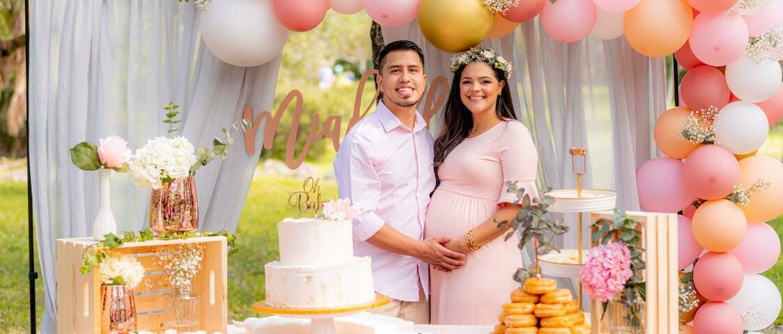 A pregnant couple celebrating their baby shower