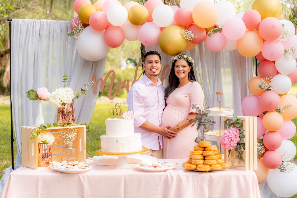 A pregnant couple celebrating their baby shower
