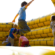 children having fun in an inflatable castle