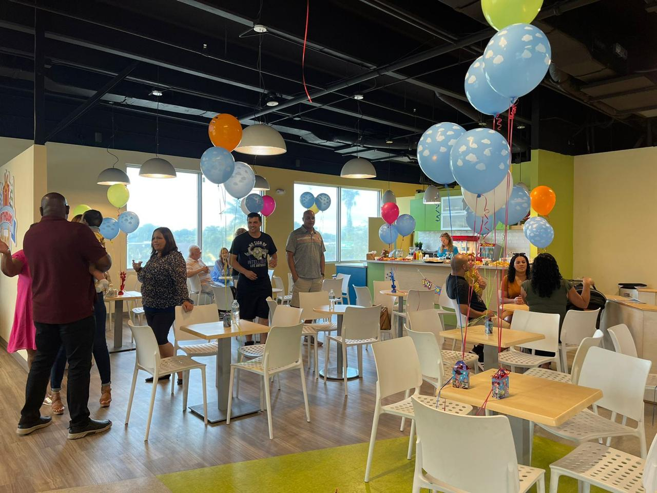 An image of people at an indoor party