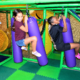children playing at an indoor playground