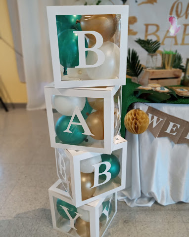 BABY written in separate blocks as part of baby shower décor at BirthdayLand