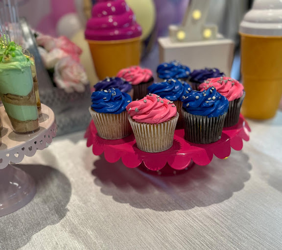 Pink and blue cupcakes for a baby shower décor at BirthdayLand