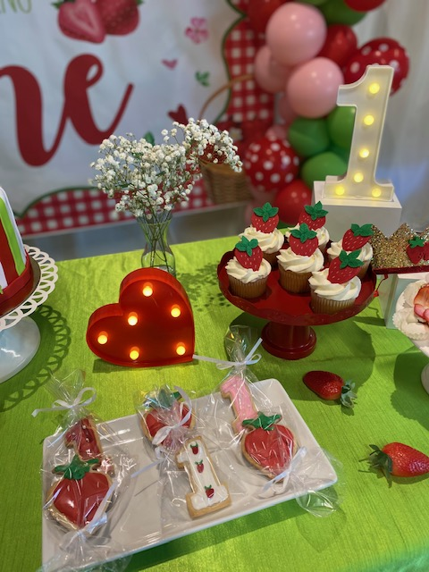 a party table for a first birthday party