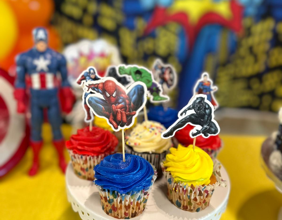 an MCU birthday party theme with cupcakes