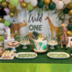 a table covered with party foods for a kid's party