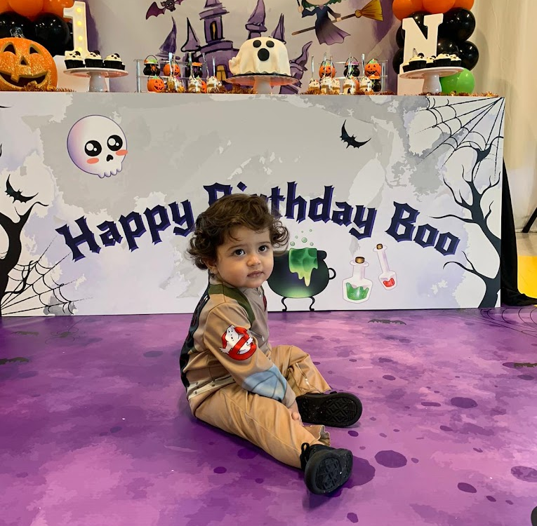 A toddler at a birthday party