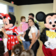 Parents and kids enjoying at a birthday party