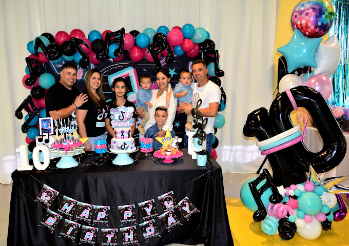 A group photo at a music and TikTok-themed birthday party at BirthdayLand