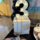 An image of birthday décor and snacks on a table