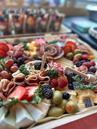 A closeup of a fruit platter with cheese at a birthday celebration at BirthdayLand